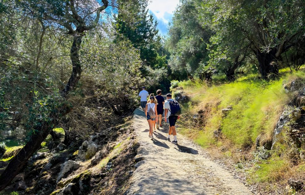 group of people hiking in the nature in corfu